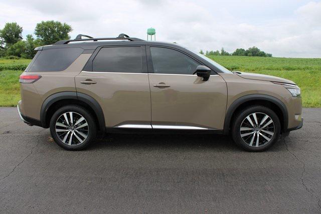 Photo of 2023 Baja Storm/Super Black Roof Nissan Pathfinder