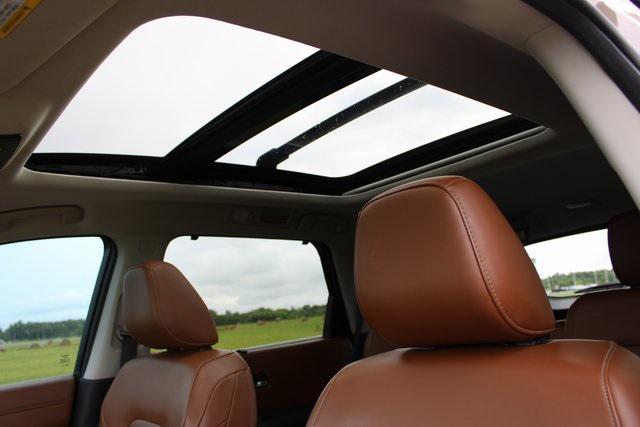 Photo of 2023 Baja Storm/Super Black Roof Nissan Pathfinder
