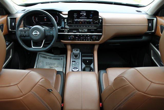 Photo of 2023 Baja Storm/Super Black Roof Nissan Pathfinder
