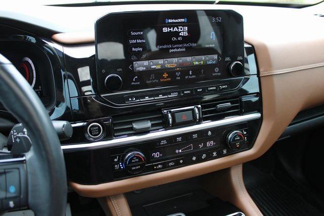 Photo of 2023 Baja Storm/Super Black Roof Nissan Pathfinder
