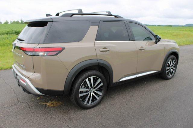 Photo of 2023 Baja Storm/Super Black Roof Nissan Pathfinder