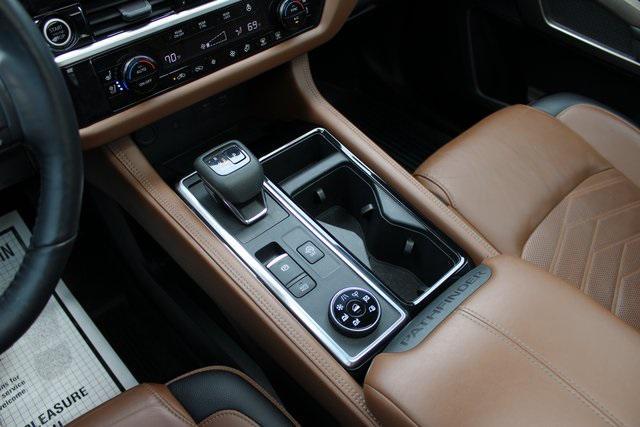 Photo of 2023 Baja Storm/Super Black Roof Nissan Pathfinder