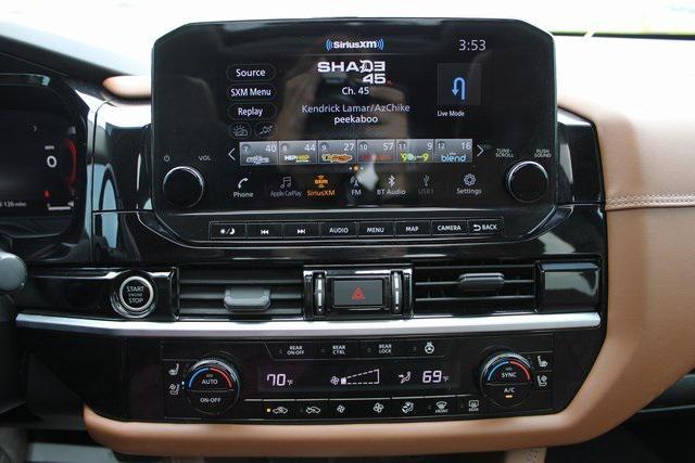 Photo of 2023 Baja Storm/Super Black Roof Nissan Pathfinder