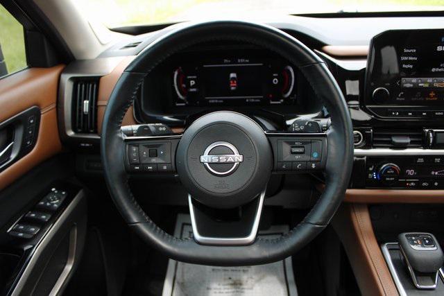 Photo of 2023 Baja Storm/Super Black Roof Nissan Pathfinder