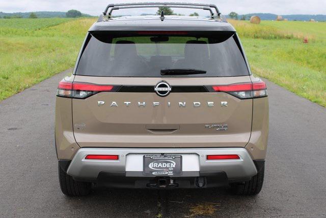 Photo of 2023 Baja Storm/Super Black Roof Nissan Pathfinder