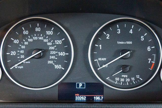 Photo of 2013 Melbourne Red Metallic BMW 320