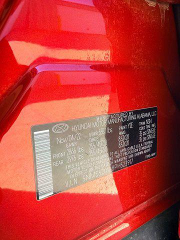 Photo of 2023 Calypso Red Hyundai SANTA FE
