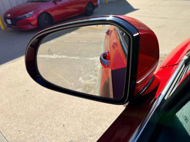 Photo of 2023 Calypso Red Hyundai SANTA FE