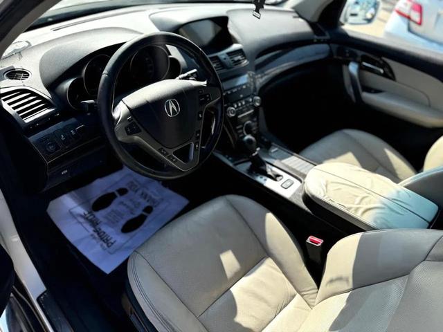 Photo of 2010 Pearl White Acura MDX