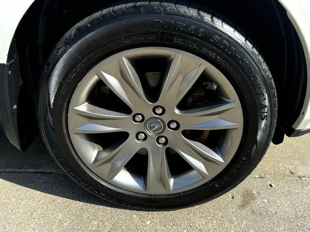 Photo of 2010 Pearl White Acura MDX
