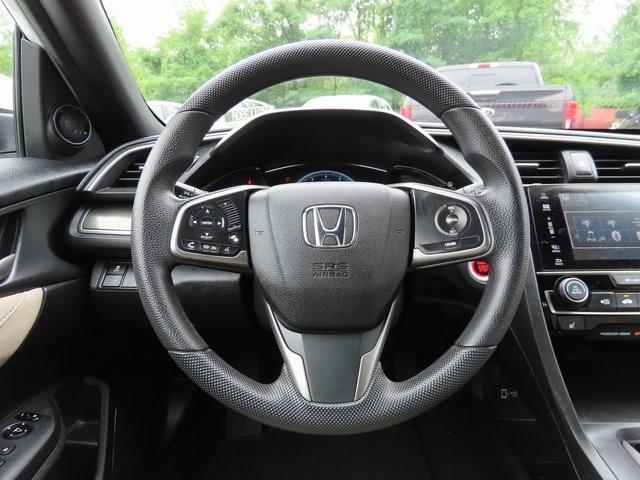 Photo of 2018 White Orchid Pearl Honda Civic