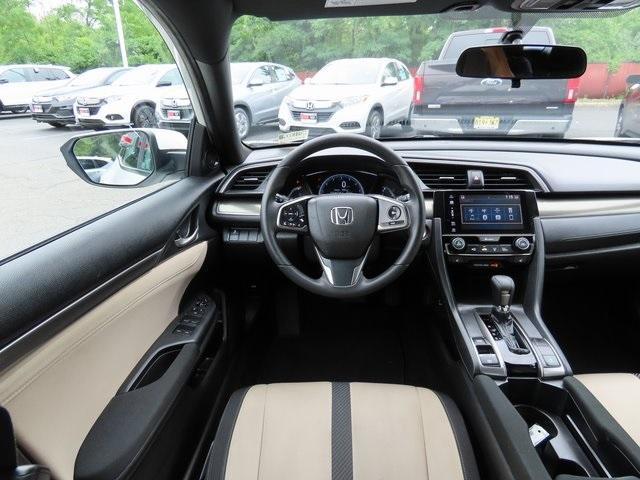 Photo of 2018 White Orchid Pearl Honda Civic