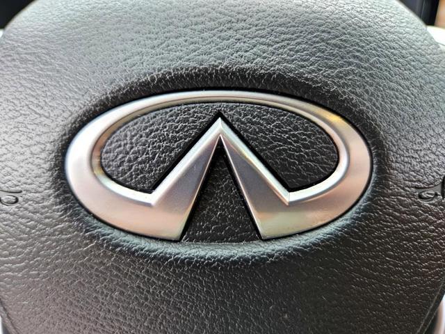 Photo of 2024 Black INFINITI QX60