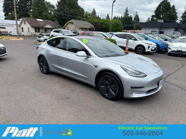 Photo of 2018 Silver Tesla Model 3