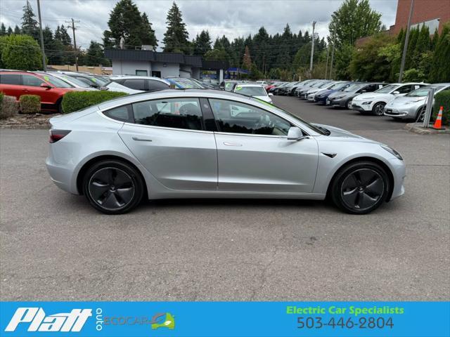 Photo of 2018 Silver Tesla Model 3