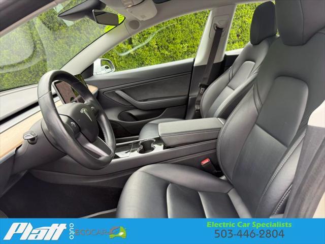 Photo of 2018 Silver Tesla Model 3