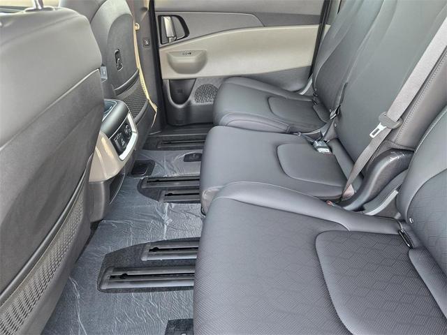Photo of 2026 Aurora Black Pearl Kia Carnival Hybrid