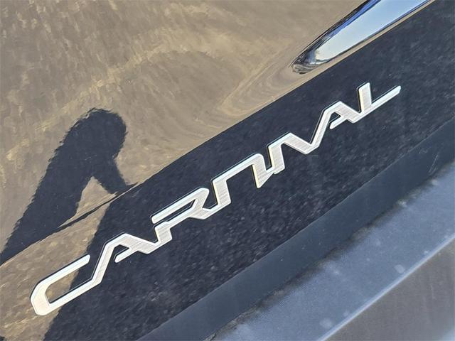 Photo of 2026 Aurora Black Pearl Kia Carnival Hybrid