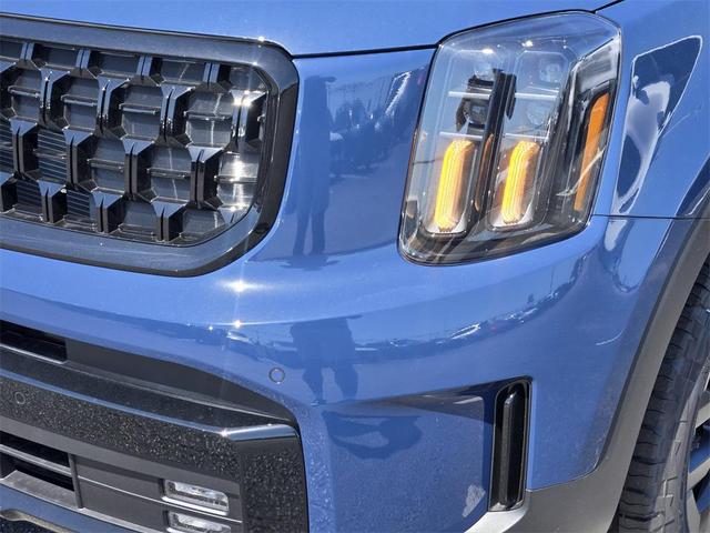 Photo of 2025 Midnight Lake Blue Kia Telluride