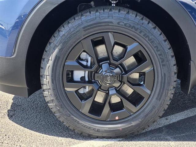 Photo of 2025 Midnight Lake Blue Kia Telluride