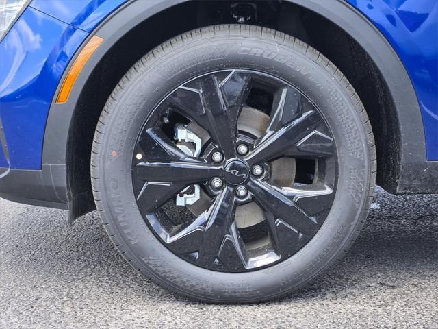 Photo of 2025 Sapphire Blue Kia Sportage