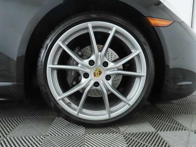 Photo of 2024 Jet Black Metallic Porsche 718 Cayman