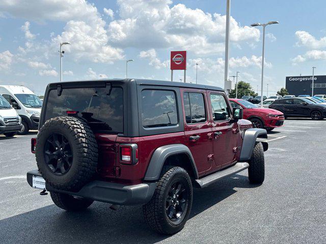Photo of 2021 Snazzberry Pearlcoat Jeep Wrangler Unlimited