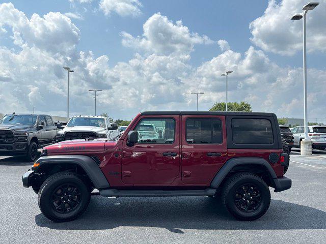 Photo of 2021 Snazzberry Pearlcoat Jeep Wrangler Unlimited