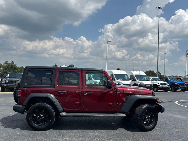 Photo of 2021 Snazzberry Pearlcoat Jeep Wrangler Unlimited