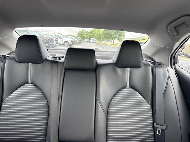 Photo of 2023 Midnight Black Metallic Toyota Camry