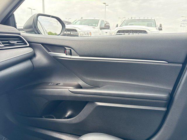 Photo of 2023 Midnight Black Metallic Toyota Camry