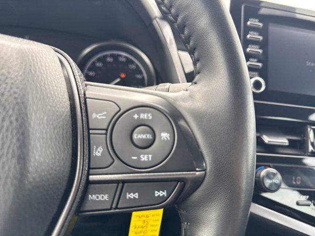Photo of 2023 Midnight Black Metallic Toyota Camry