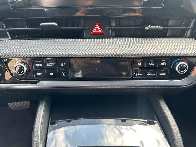 Photo of 2023 Steel Gray Kia Sportage Hybrid