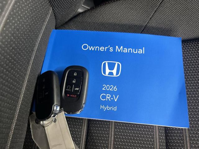 Photo of 2026 Radiant Red Metallic Honda CR-V Hybrid