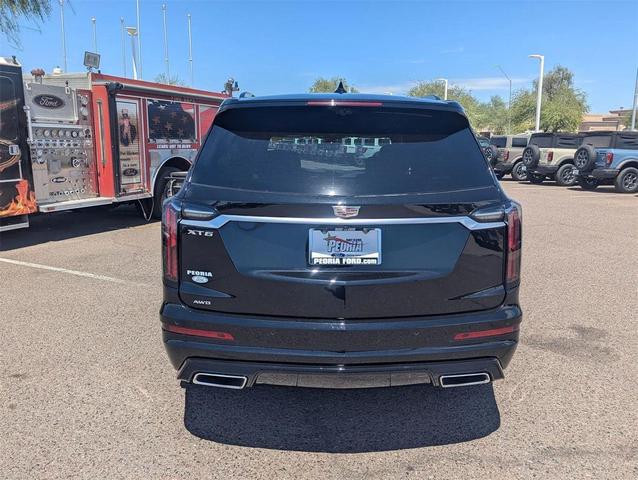 Photo of 2024 Stellar Black Metallic Cadillac XT6