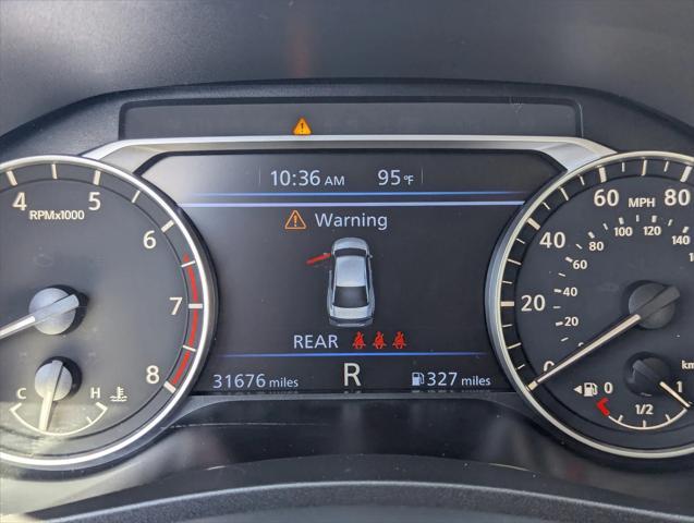 Photo of 2024 Glacier White Nissan Altima