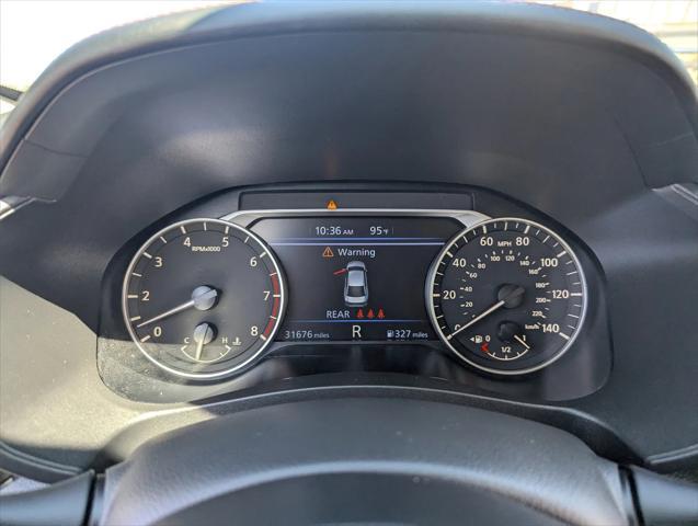 Photo of 2024 Glacier White Nissan Altima