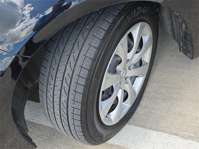 Photo of 2024 Midnight Black Metallic Toyota Corolla Hybrid