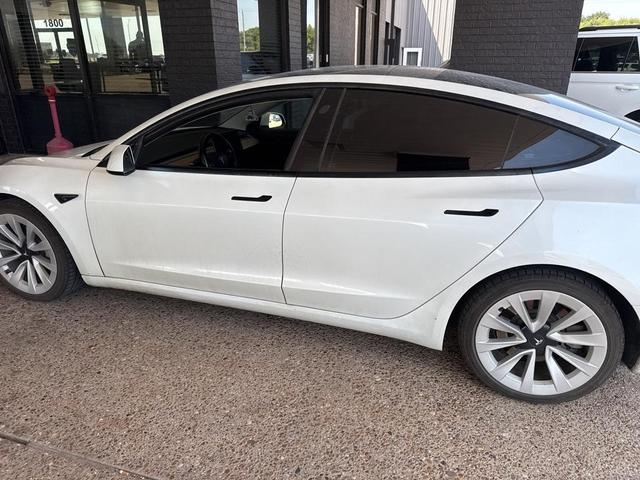 Photo of 2021 Pearl White Multi Tesla Model 3