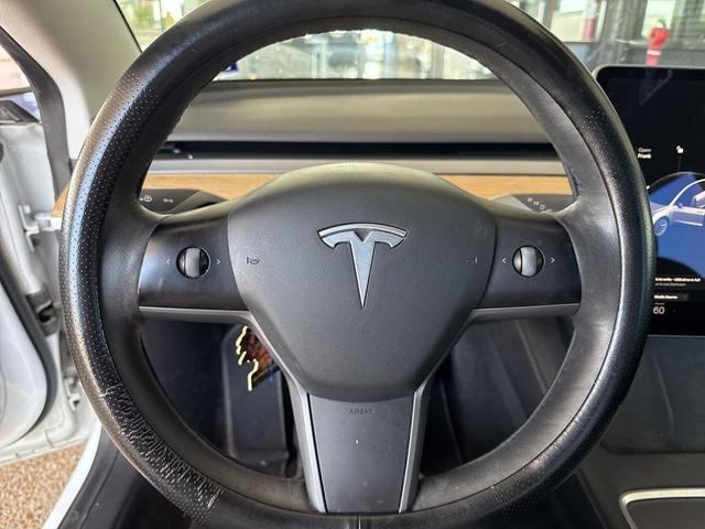 Photo of 2021 Pearl White Multi Tesla Model 3