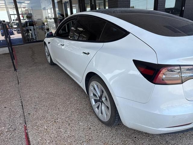 Photo of 2021 Pearl White Multi Tesla Model 3