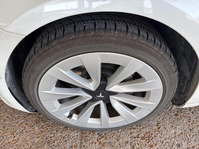 Photo of 2021 Pearl White Multi Tesla Model 3