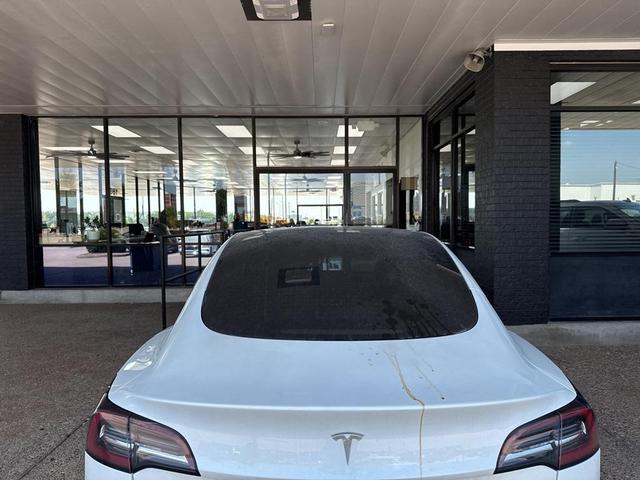 Photo of 2021 Pearl White Multi Tesla Model 3
