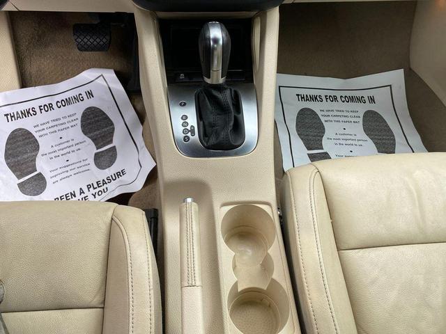 Photo of 2014 Black Oak Brown Metallic Volkswagen Eos