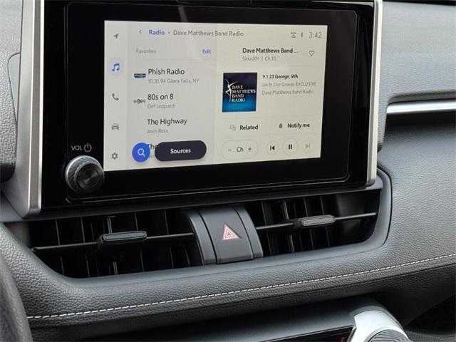 Photo of 2025 Ruby Flare Pearl Toyota RAV4 Hybrid