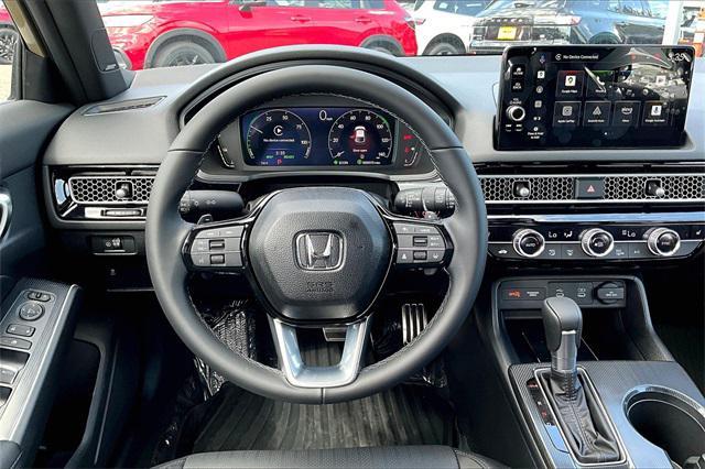 Photo of 2025 Sand Dune Honda Civic Hybrid