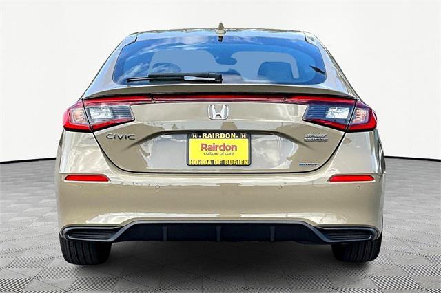 Photo of 2025 Sand Dune Honda Civic Hybrid
