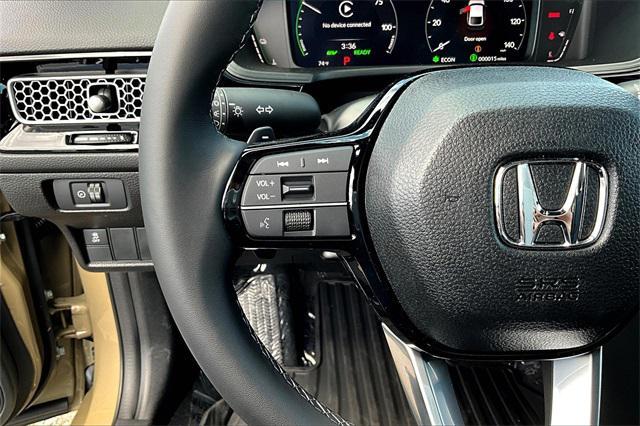 Photo of 2025 Sand Dune Honda Civic Hybrid