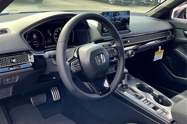 Photo of 2025 Blue Lagoon Pearl Honda Civic