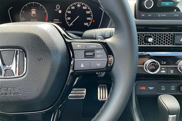 Photo of 2025 Blue Lagoon Pearl Honda Civic